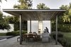 Modern home with Outdoor, Back Yard, Hardscapes, and Concrete Patio, Porch, Deck. Most of the fixed carpentry for this project was designed by AS/D and built by a contracted carpenter. Tzalam, the wood of choice, resists humidity and heat. Photo of A Minimalist Mexican Retreat that Uses an Array of Strategies to Beat the Heat