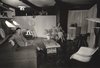 Roy and Patricia Hamma enjoy time in their living room, furnished with Charles and Ray Eames pieces. Once the couple's MHA 111 model was complete, Roy Hamma, an attorney, hired a professional photographer to document their newly built home, which was one of the original 30 “guinea pig” properties.
The MHA cooperative purchased 800 acres of land on the Brentwood side of the Santa Monica Mountains and worked with modernist architects A. Quincy Jones and Whitney R. Smith and structural engineer Edgardo Contini to build 350 homes. Only 85 houses from the original Jones/Smith plans actually saw the light of day. Photo of A New Book on the Los Angeles Development of Iconic Modernist Architect A. Quincy Jones modern home