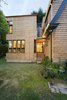 He selected the material for its dimensional stability, warm color tone, and natural weather resistance with minimal maintenance needed. Photo 2 of Eastside Addition modern home