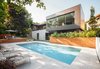 Thellend Fortin Architectes designed this two-story addition in the OUtremont neighborhood of Monteal to capture views from the steeply sloping lot. Photo of Prince-Philip Residence modern home