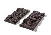 While architecture and chocolate seem like an unliekly pairing, it was a natural exploration for Snarkitecture. "Much of our work looks to existing, familiar architecture or objects and explores ways to alter or reimagine their material to create something new and unexpected," the firm says. "Given the chance to work with Dandelion and use chocolate as a material was a completely new opportunity for us. The design we developed creates an element of surprise while referencing the preexisting proportions of Dandelion's standard chocolate bar. When you unwrap the bar, a fracture running around its edge is revealed. When pulled apart along this fracture, two perfectly opposite landscapes come into view. This break at the edge and the excavated surface texture of the two halves play on the idea of a 'broken' object that is, in fact, completely functional, and, in this case, also happens to be delicious." Photo of A Chocolate Bar that Tastes as Good as it Looks modern home