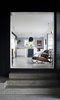 The owners, a couple who work at home, clamored for more space with the new addition. Solbjør created dramatic entrances, such as these stone steps leading into the kitchen, to heighten the contrast between the old and new. Photo 3 of Charred Cedar modern home