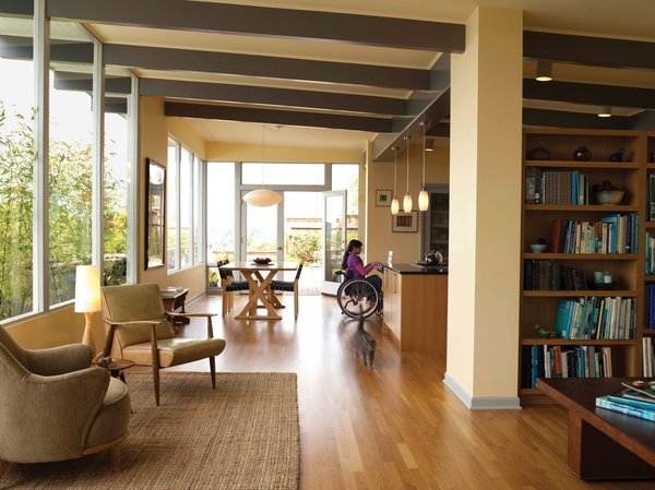 Having lived in, and loved, a modern house built in 1954 in Seattle’s Magnolia neighborhood since buying it in 1996, architect Karen Braitmayer and her husband, marine mechanic David Erskine, recently came to realize that the house was overdue for some modifications. Braitmayer, whose firm, Studio Pacifica, specializes in universal access space planning and ADA compliance for commercial and residential projects, is a wheelchair user, as is her and Erskine’s teenage daughter. With its open layout and single-floor plan, the house worked fairly well for many years, but, as Braitmayer says, "It was really my daughter growing up that spurred us to make some changes. Her disability is a little bit different from mine, and some of the things I was able to work around for a long time weren’t going to work for her." Braitmayer called in another architect, Carol Sundstrom of Seattle-based Röm Architecture Studio, who specializes in single-family remodels and with whom Braitmayer has collaborated on many projects.