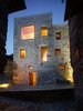 The renovation of this old stone structure by Wespi de Meuron Romeo architects was, at times, as much archeology as architecture. The small square in front of the building, the only in the village of Scaiano, dates the building, a former brandy distillery fortified with both spiritis and stone walls. After reinforcing the roof and replacing the wood beam floors with concrete, the team started to dig in. Photo of Scaiano Stone House modern home