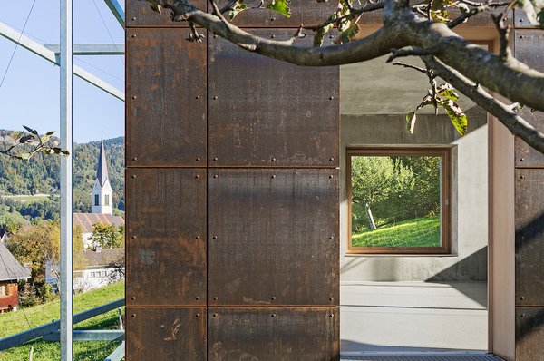 The structure is clad in weathered steel with an interior of concrete and untreated oak window frames. Tonko's design is meant to be what he describes as a "delicate workshop," an easy-to-clean, distraction-free space that allow for concentration and creativity.