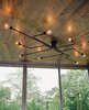 Modern home with Living Room and Pendant Lighting. UrbanLab designed the circuit board–like lighting fixtures in the living area. Photo 9 of New Grass Roots