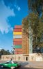 Modern home with Exterior, Apartment Building Type, and Shipping Container Building Type. The exposed wooden stairwell creates a warm contrast with the concrete and metal used elsewhere. Photo of 20 Ideas On What You Can Do With Old Shipping Containers