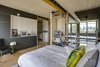 The design consists of three layers: an energy-efficient, insulating structural envelope, an integrated building systems core with the mechanical, electrical, and plumbing systems, and an exterior shell equipped with solar systems and the ability to shade and collect rainwater. Photo of Things You Should Know About Modern Prefab Construction modern home