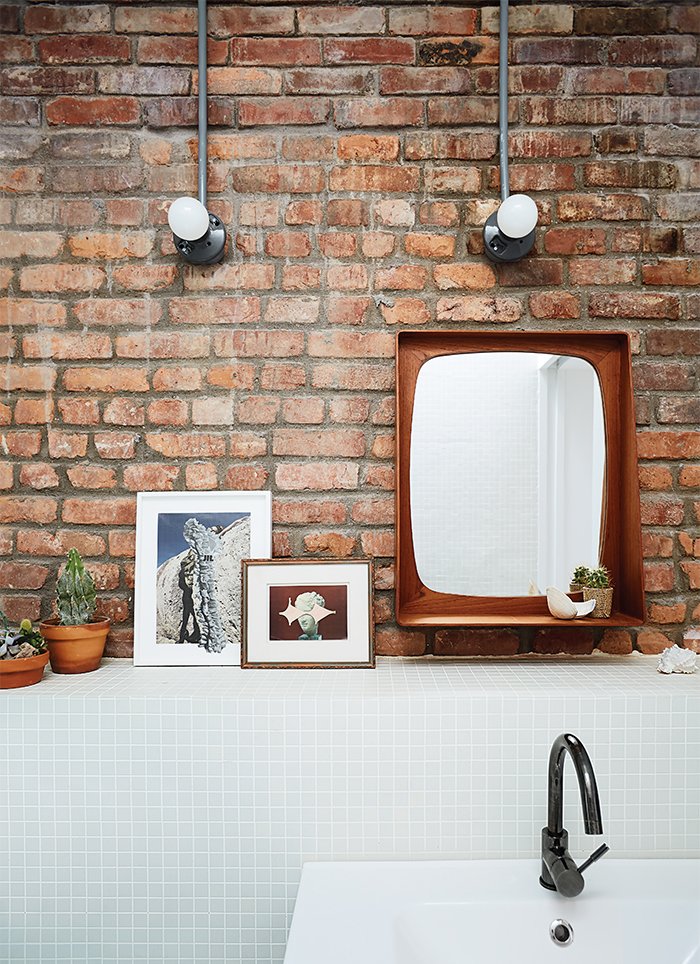 modernbrooklynrenovationhasikeavanityandwhitetilesbymineral