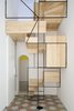 The oak-and-steel structure, as much a sculpture as a set of stairs, animates the interior of this slender, multi-story building. Photo of A Mind-Blowing, Mondrian-Esque Staircase modern home