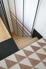 The owner of the home, a writer for the Italian newspaper La Repubblica, asked Librizzi to create a cultured home, so he felt inspired to create a standout piece. Photo of A Mind-Blowing, Mondrian-Esque Staircase modern home