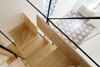 An aerial view of Librizzi's layered staircase shows how the wood steps are pieced together. Photo of A Mind-Blowing, Mondrian-Esque Staircase modern home
