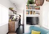 Modern home with Living Room, Chair, Shelves, Dark Hardwood Floor, and Pendant Lighting. An enthusiastic cook, Miller says she can easily work in the galley-style kitchen. The reclaimed-wood surround echoes the exterior cladding. Photo of Inside 5 Tiny Homes, All Under 600 Feet