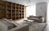 A built-in larch bookshelf occupies an entire wall on the second floor den. Photo 6 of House in Moscow modern home