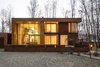 The house may be large at 5,382 square feet, but its extensive glazing makes it appear weightless. Photo 7 of House in Moscow modern home