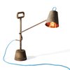 Both sturdy and whimsical, the Copper Lamp 10Kg by Samuel Treindl and Tobias Sieber is a tongue-in-cheek way to collect a full ten kilograms of metal deposits as a long-term investment. Photo of Fall Design Trend: Gold, Brass, and Copper Accents modern home