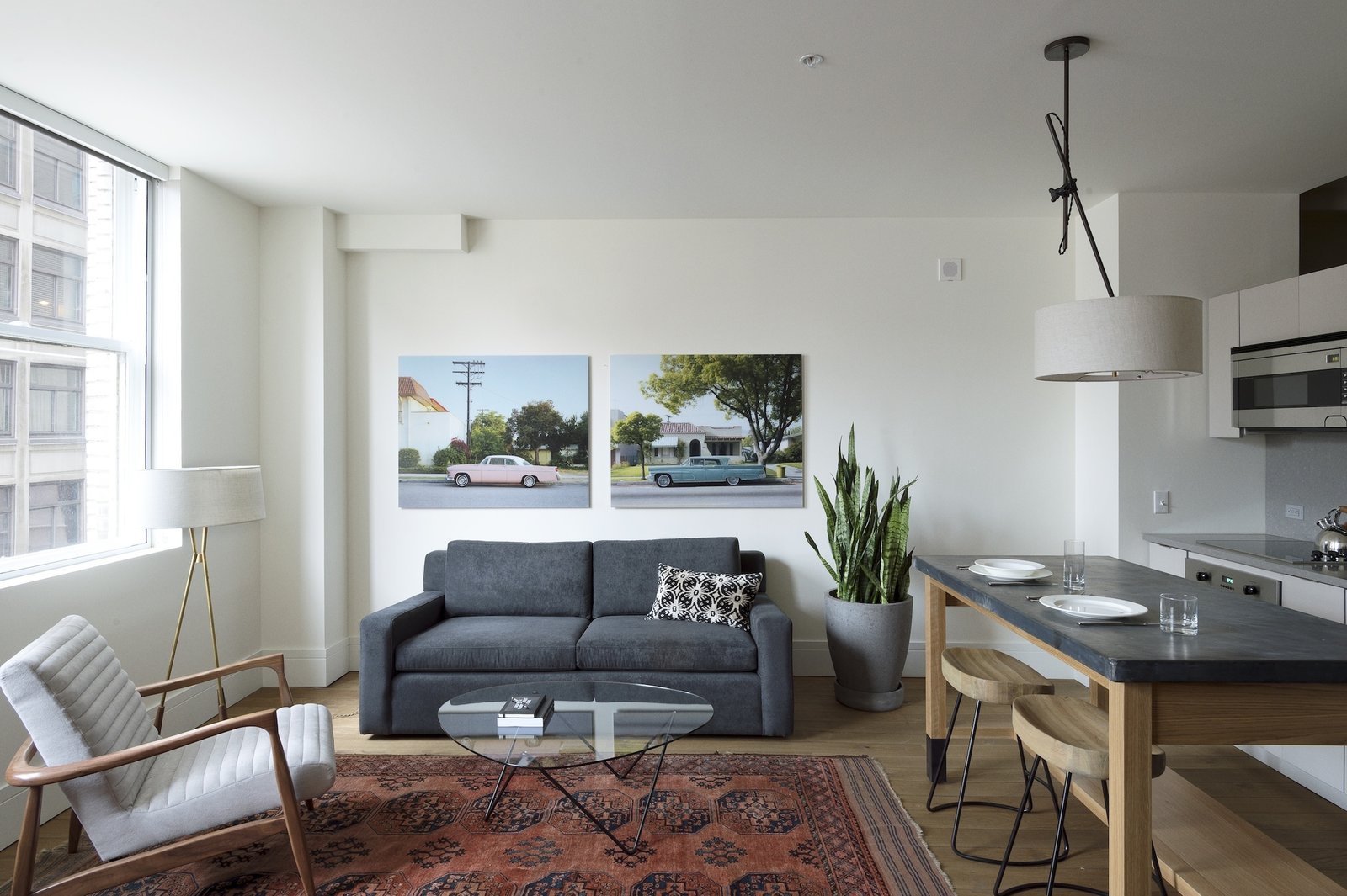 The living areas are equipped with 100-year old Turkmen rugs and Gubi coffee tables.