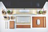 The monitor stands, keyboard trays, and mini planters are meant to keep the average desk from looking too much like a museum exhibition on Scandinavian design. Photo of Streamlined Wood-and-Leather Desk Accessories modern home