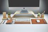 The mouse pads and keyboard trays have cork lining on the bottom to keep them from shifting during use. Photo of Streamlined Wood-and-Leather Desk Accessories modern home