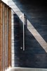 Modern home with Doors, Exterior, and Wood. The front door of this house in Scotland is built from charred cedar boards—a traditional way of fireproofing wood developed in Japan. In this case, the effect on the front door is likely more aesthetic than preventative, though you can never be too careful. Photo of Facade Focus: Charred Cedar