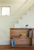 The staircase was painted white to promote uniformity of design. Photo 6 of Half & Half House modern home