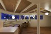 Globe pendant lights by Panasonic hang whimsically throughout the house. The strip window sits high for privacy. Photo 7 of Half & Half House modern home