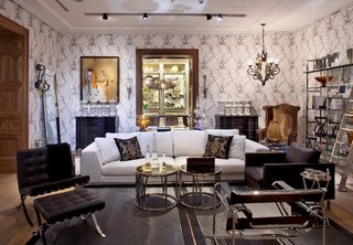 Inside the mansion, each room displays a furniture collection that coordinates with the home's architectural style.