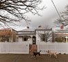The old house had suffered several lean-to additions over the years that darkened the interior; these were removed to let in more light. Altogether, the architects retained 818 square feet of the original house and added on another 1,055 square feet, bringing the home’s total imprint to 1,873 square feet. Photo 2 of M House modern home