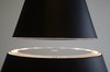 Both the Eclipse and Silhouette lamp models produce light with low-energy LED bulbs embedded in the lower half of the lampshade. Photo of Whimsical Floating Lamps modern home