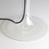 The Eclipse is mounted on a clear foot that houses a black power cord, which adds to the appearance that it is floating. Photo of Whimsical Floating Lamps modern home