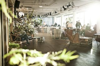 The clean, simple aesthetic of the lobby includes Katakana chairs and design pieces from Donna Wilson. There is also an original Jugendstil couch, which has converted into a swing. You can sit at the tasteful bar and coffee shop, taking in the beautiful view through the preserved glass facade of the building.