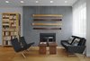 Modern home with Living Room, Chair, Sofa, Coffee Tables, and Gas Burning Fireplace. The living area contains a Poul Kjærholm PK 31 sofa and PK22 chairs. The table is custom. Photo 4 of Modern Dream Penthouse in New York City Makes the Most of Natural Light