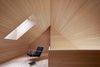 Modern home with Windows, Skylight Window Type, and Wood. A skylight floods the loft space with daylight and offers views of the stars at night. Photo 8 of House For Julia Björn