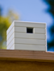 The modern, clean design of this birdhouse provides "simple avian living". The eight color choices give you a chance to draw as much or as little attention to this nest as you like. Photo of 13 Great Modern Birdhouses modern home