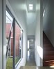 Polished concrete covers the ground level. Photo 6 of Annie Street modern home