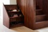 The base of the stairwell includes a hidden compartment to conveniently store shoes. Photo 6 of Lantern Home modern home
