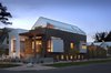 Modern home with Exterior, Wood Siding Material, Metal Siding Material, House Building Type, and Metal Roof Material. Apart from a “generous” master bedroom, Mitchell says that the couple also wanted a rooftop deck to see views of downtown Denver. A sloped roof kept the building up to code, and the outdoor deck “was achieved by shifting the upper volume backwards from the front of the house,” he says. Photo 8 of Highlands House