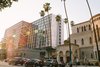 The concrete and glass structure reaches 12 stories above the city streets on Wilshire Boulevard, at the heart of Koreatown. Built in 1964, the Brutalist-style building originally stood as a Hyatt Hotel, and re-opened as the Line hotel in 2014. In keeping an authentic Los Angeles vibe at the forefront, the Sydell Group, which also owns and operates the Ace hotels and New York’s NoMad Hotel, has collaborated with local artists, restaurateurs and businesses. A must-visit at the Line is the design and lifestyle boutique Poketo, which stocks everything from apparel, to books, magazines, stationary, and apothecary items. Photo of Modernist Building in Los Angeles' Koreatown is Redesigned as The Line Hotel modern home