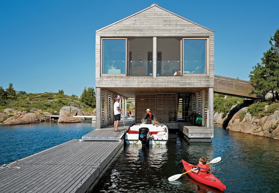 Make it float!

On the edge of a tiny island on Lake Huron, accessible only by boat, this buoyant summer home lives the life aquatic.