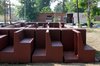 A detail shot of the church pew–like benches. Photo of Watch an Unassuming House Unfold into a Community Theater modern home