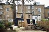 The renovation added a touch of modernity to the building without overwhelming it. The yard remains a work in progress, as the client is still working through ideas for a kitchen garden. Photo of A Modern Addition Gives a London Chef a Dream Kitchen modern home