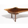 SUSHI TABLE
If wood-clad walls are too big an undertaking, consider incorporating the warm wood trend by bringing in some quality furniture pieces. Conceived by Paul White and Dan Morgan, this table is made from a single piece of walnut with a live edge. The legs are attached via a mortise-and-tenon joint technique; a sliver of maple in the dowel is visible on the table surface. The table's inception began with creating a proper table for sushi for two, sitting on the floor in the Japanese style. Photo of Fall Design Trend: Warm Woods modern home