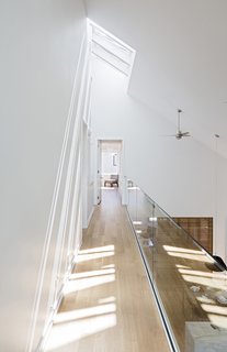 Strategic site planning and smart technology help the 3,200-square-foot Great Gulf Active House achieve hyper-efficiency. The Toronto-based architecture firm, superkül, used triple-glazed windows; a solar hot water system; zoned heating; a fully automated HVAC system, skylights, and roller shades; LED lights; and spray foam insulation, among other green strategies.