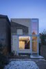 At a London terrace house, Tsuruta Architects undid one rear addition and instituted another that better recalls the home's form and origins. The lighter brick extension mimics its host's sloping gesture. Photo of An Award-Winning London Addition Balances New and Old modern home