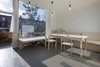 The architects' emphasis on straightforward materials, available from any local hardware store, belies a tech-forward approach. Many elements, including some furnishings, were condensed in CNC and brought to the site via flatpack, saving time and money on fabrication. Photo of An Award-Winning London Addition Balances New and Old modern home