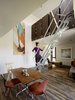 Modern home with Staircase, Metal Railing, and Metal Tread. Rather than a one-off custom piece, Baker designed the daybed as a prototype and worked with Ohio Design on its fabrication. Photo of This Net-Zero Residence Might Be the Greenest Home in San Francisco
