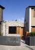 “We have described the house as an urban cabin and this captures the essential character we were seeking to achieve,” says architect Charles Thomson. “Because the plan is so tight, it was critical that every part was considered carefully. But we also wanted spaces that were simple and flexible to accommodate the typical range of family activities.” Photo of Islington Residence modern home
