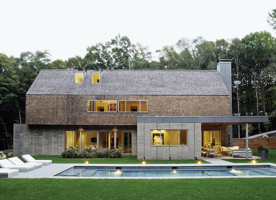 Even the pool is the result of mixed influences: Andrew wanted a series of shallow, gently sloping hangout zones; his wife, Amy, a former competitive swimmer, needed a full lane deep enough for laps.