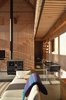 A Magnum wood-burning cookstove by Sopka provides heat. Photo of An Eco-Friendly New Hampshire Home Stands Out for its Simplicity modern home