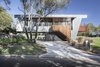 Modern home with Exterior, House, Metal Roof Material, and Wood Siding Material. “In consideration of the context, the design aimed to reinterpret the traditional beach shack vernacular in a contemporary way by embracing traditional materials, including corrugated metal, fiber cement sheeting, and timber elements,” Rathmayr says. Photo of Northern Rivers Beach House